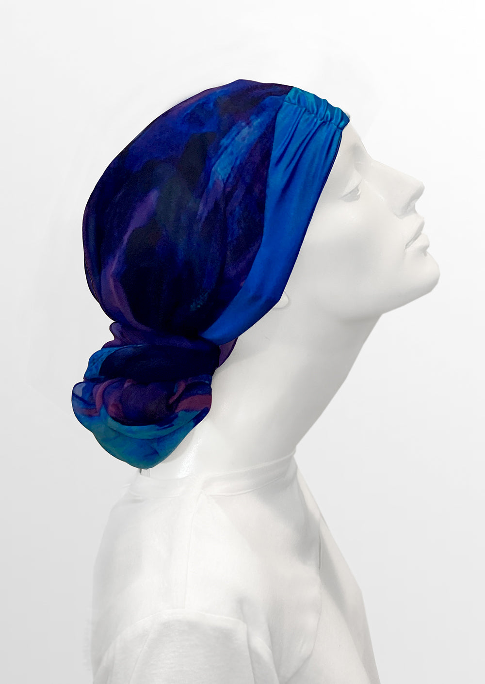 side view bright blue and purple silk & chiffon headscarf on mannequin