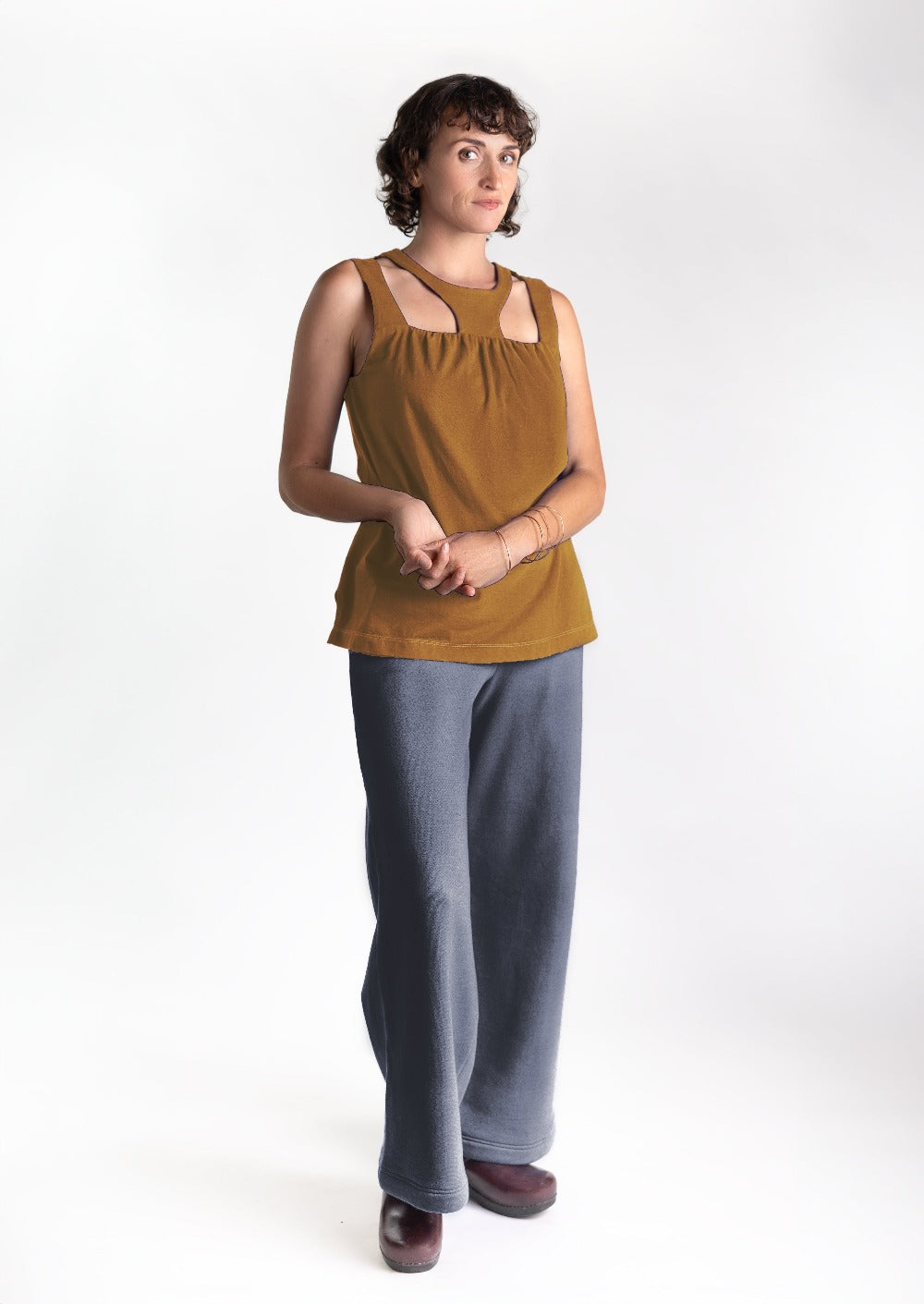 fashionable woman in a medically accessible adaptive wear tank top 